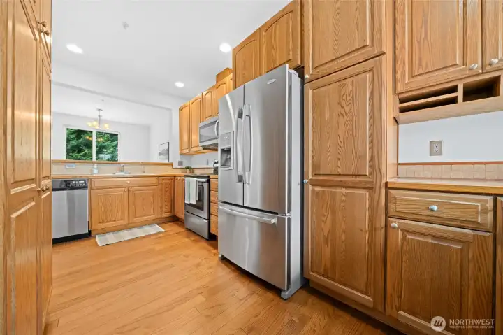 You will love the abundant cabinetry throughout this kitchen.