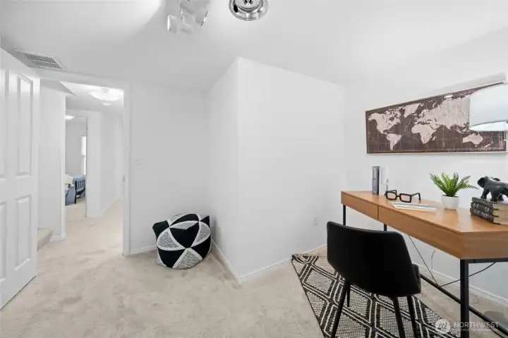 Excellent "flex" room that could be used as an office, play room or additional storage.