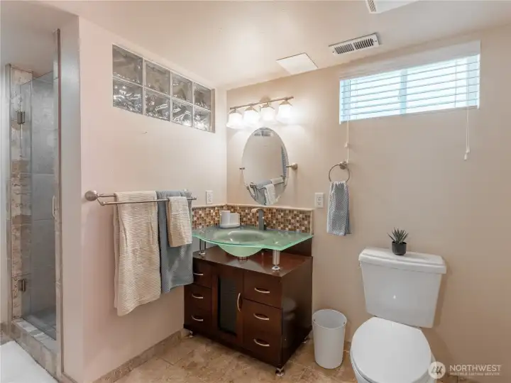 Second bathroom located in lower level for added convenience