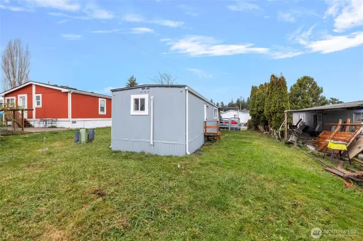 Big backyard, ready for a cute fence and your 4 legged best friend.