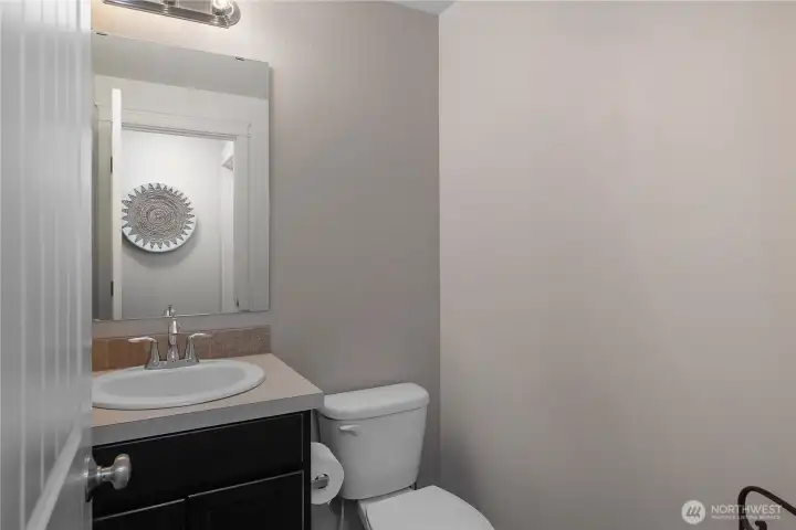 Main floor powder room. 1/2 bath.