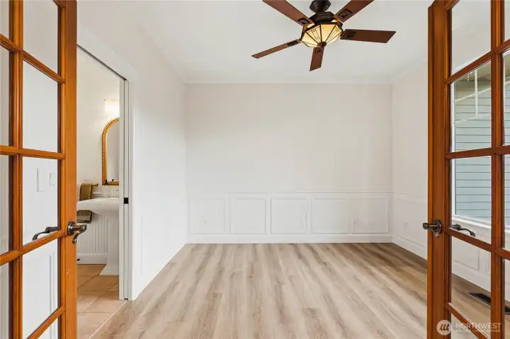 Main-level office or potential guest room with closet