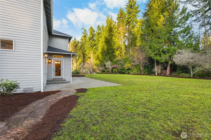 Spacious backyard with BBQ hookup, ideal for outdoor gatherings