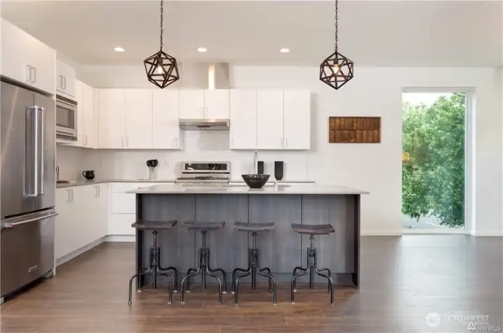 Kitchen in larger unit, photo when staged