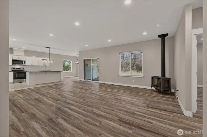 Spacious living room with cozy propane stove