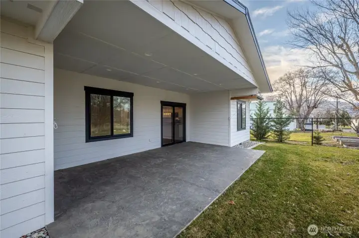 Oversized covered stamped concrete patio