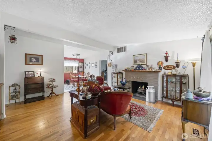 Vaulted ceilings, oak hardwood floors and wood burning fireplace