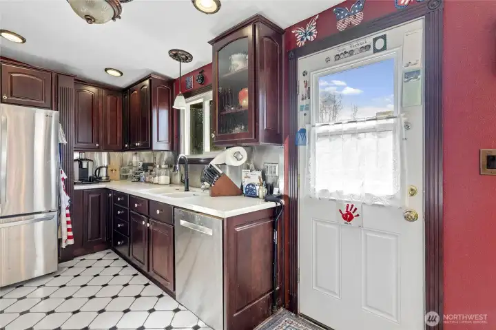 Lots of cabinets and counter space with stainless appliances