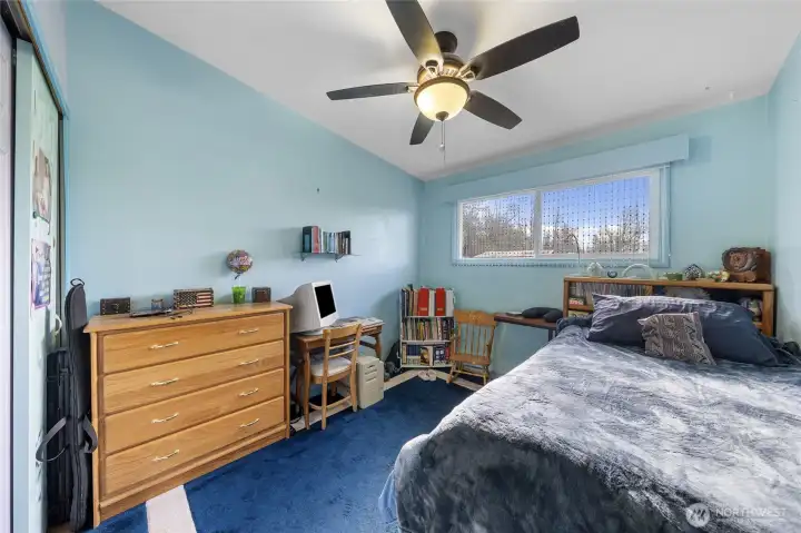 2nd bedroom~Hardwoods under area carpet