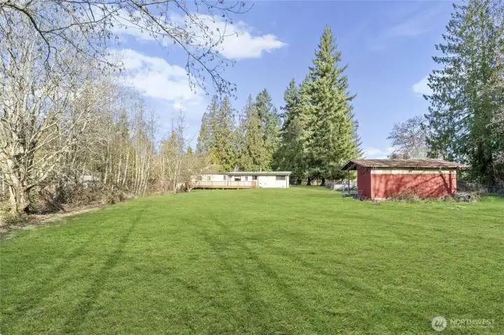 Look how nice and level this is! Grass has been enhanced on these back yard shots, though give it a month or so and it will look like this!