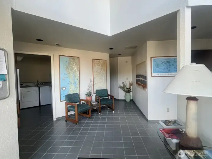 Clubhouse entry at Murphy’s Landing Marina in downtown Gig Harbor featuring main floor laundry and restrooms with showers.