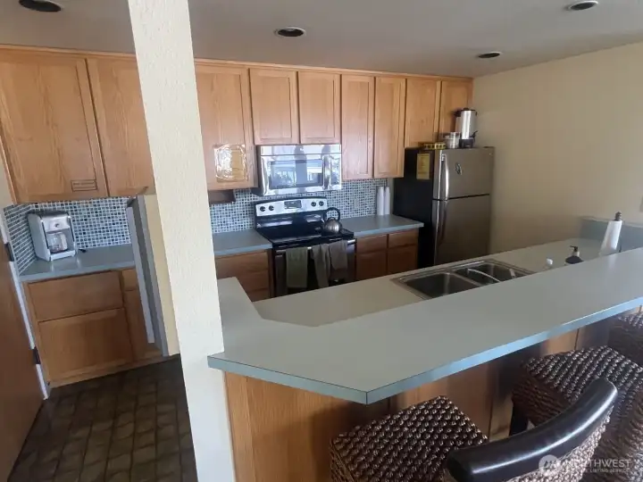 Shared clubhouse kitchen at Murphy’s Landing Marina in downtown Gig Harbor — convenient amenity for marina living.