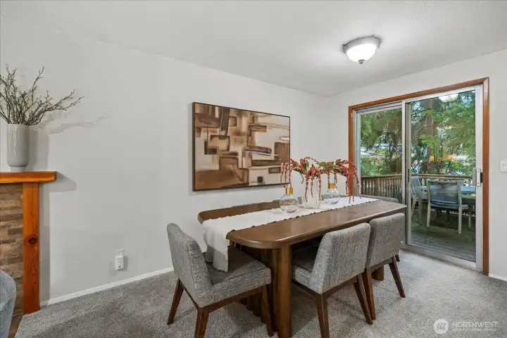 Dining room off of the kitchen.  Sliders out to the deck and backyard.