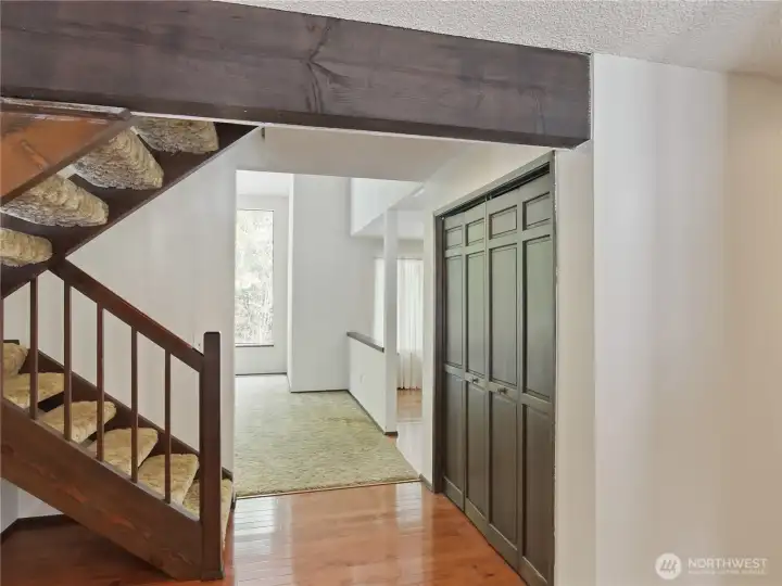Step through the inviting entry foyer, a central hub designed to seamlessly connect the loop of family activities.