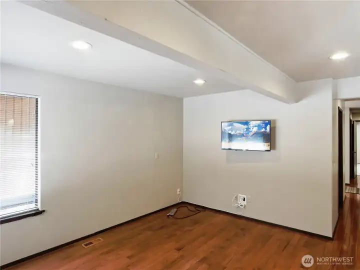 Joining family room creates an ideal, vibrant gathering place whether you're hosting a friendly game or kicking back for cozy cuddling.