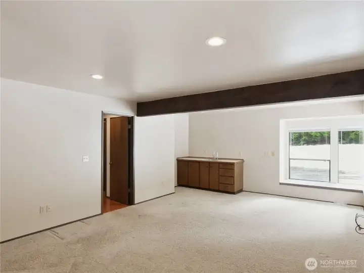 Multipurpose room for  mental & physical Reset. A built-in wetbar is especially handy for mixing energy drinks.