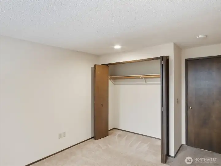 The three large bedrooms off the hallway offer ample room for growth and personalization, with plenty of space for both rest and productivity.