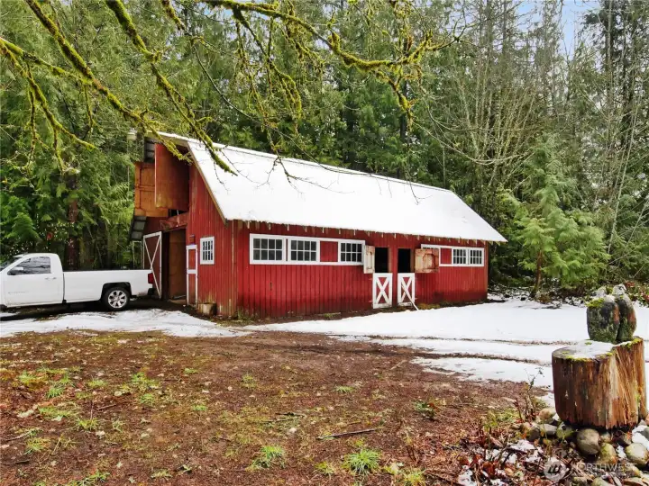 Four stalls provide the infrastructure for a true country lifestyle, whether for horses, hobby farming, or storage.