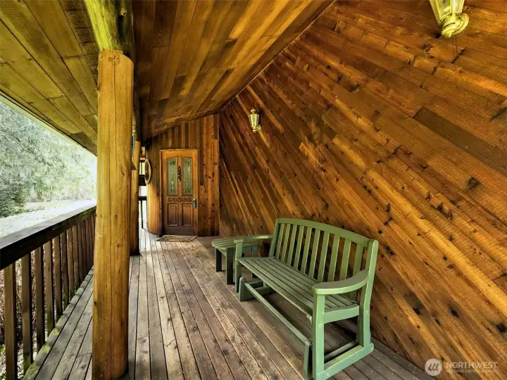 Peaceful little deck leading to the front door.