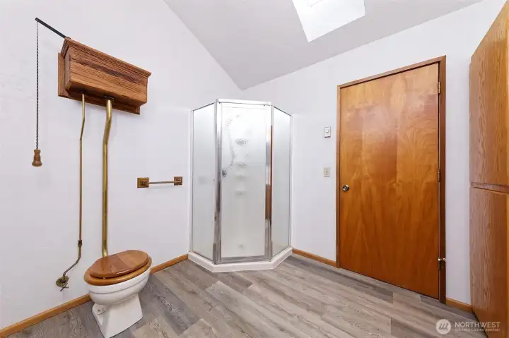 Check out the cool toilet in the primary bathroom, and corner shower.
