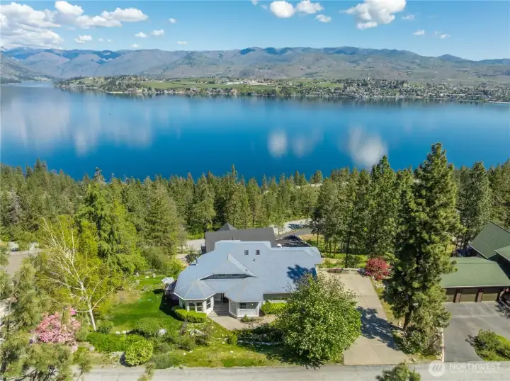 Chelan Ridge home offering 1,699 sq ft with stunning lake and mountain views. Enjoy access to community waterfront amenities, including a private boat slip perfect for embracing the Lake Chelan lifestyle. Thoughtfully positioned to capture natural beauty, this property combines comfortable living with exceptional recreational access, ideal for full-time living or a relaxing getaway.