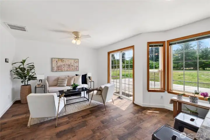 Family room with slider to the large backyard