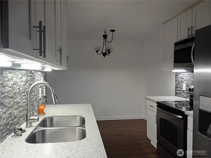 Kitchen with undercabinet lighting