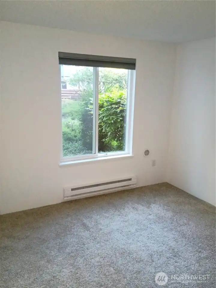 Primary bedroom with new baseboard heat