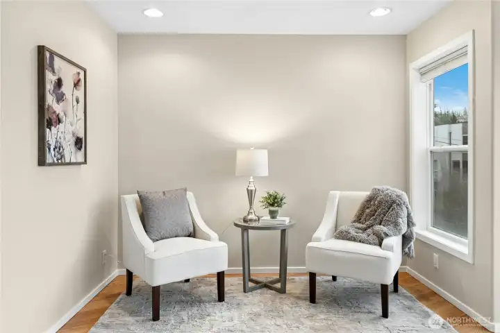 This primary suite has this space which is perfect for relaxing with a glass of wine while you enjoy the lake views. This primary suite has this space which is perfect for relaxing with a glass of wine while you enjoy the lake views.