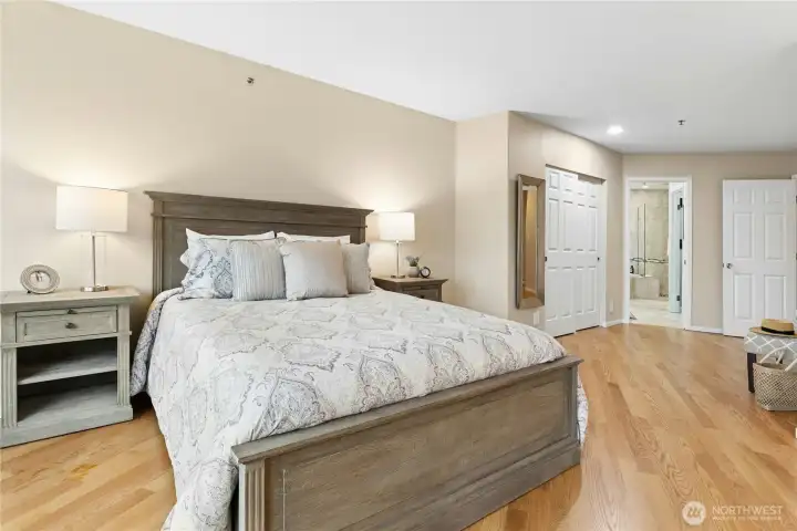 The primary suite is adjacent to the 5-piece bath and has 2 closets: one large reach-in closet and one large walk-in closet. The primary suite is adjacent to the 5-piece bath and has 2 closets: one large reach-in closet and one large walk-in closet.