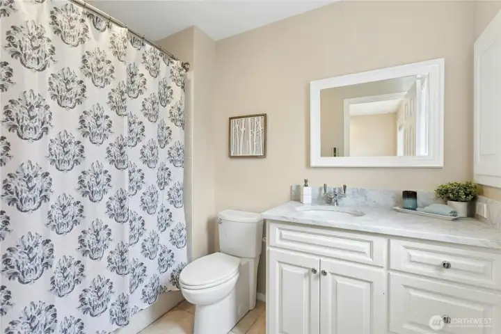 Second full bath upstairs with new vanity. Second full bath upstairs with new vanity.