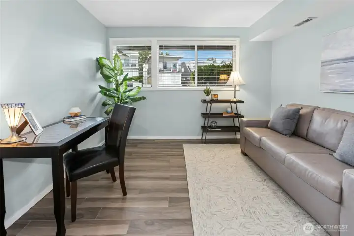 The third bedroom on the lower level has tile floor, fresh paint and a reach-in closet. Bedroom is currently staged as an office. How would you use this space? The third bedroom on the lower level has tile floor, fresh paint and a reach-in closet. Bedroom is currently staged as an office. How would you use this space?