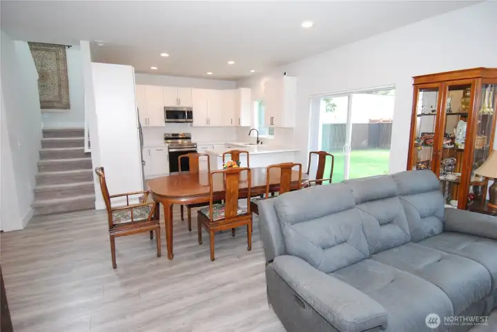 Dining area leads to convenient outdoor patio and back property