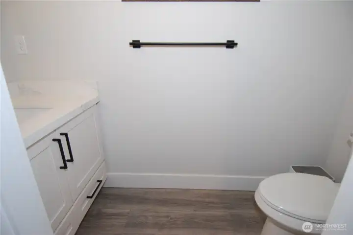 Main level half bath with whisper quiet exhaust fan