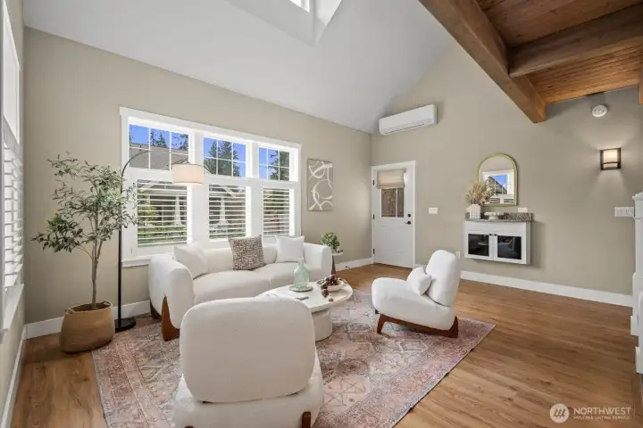 Open concept living room with so much natural light.