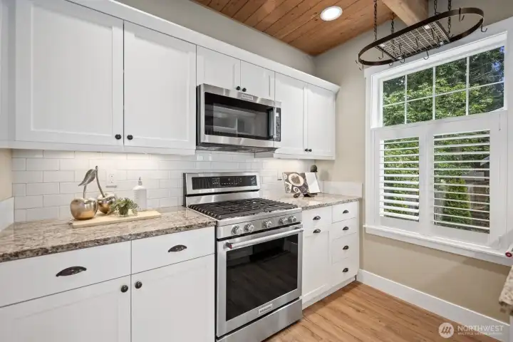 Gas range for cooking and views to your outdoor space.