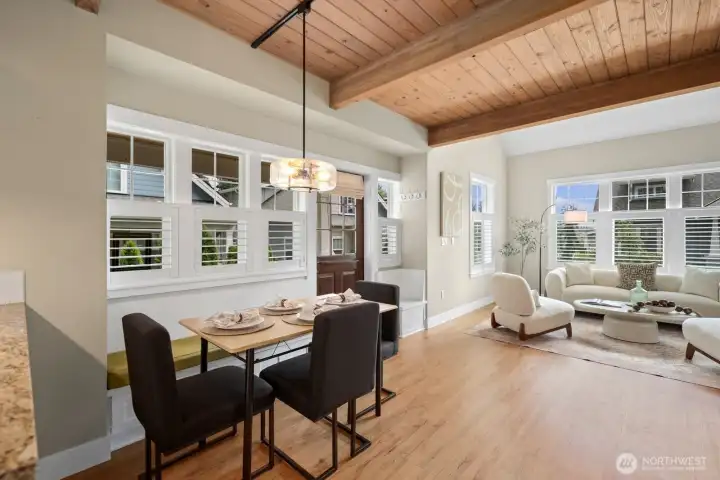 Kitchen with added luxury cabinets for extra storage and a built in seating area