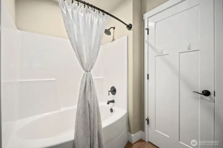 Second bathroom with soaking tub and extra