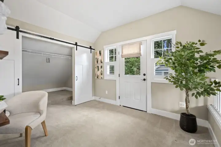 Upper flex space, with additional outdoor seating space can be used as an office den library.