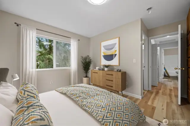 Virtually staged Main Bed.