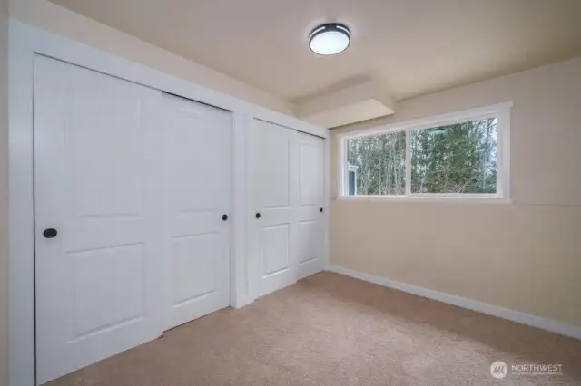 Bonus room downstairs.  This is where the hot water tank and Furnace reside.  Furnace has just been cleaned, inspected, and serviced by Glendale Heating and Air.  Motor, Pump and Heat switch just replaced and it is working perfectly.