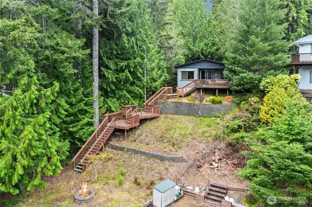 A closer look at this charming lakefront cabin, complete with steps leading directly to the water.