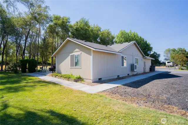 Back corner of home next to extra large parking space