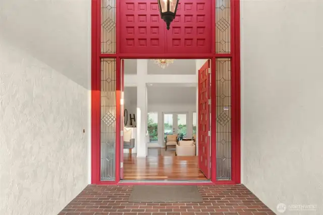 Grand entrance with custom new doors.