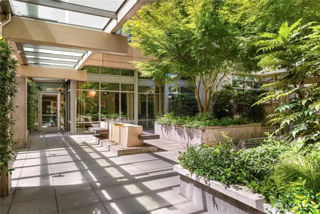 This secured property features multiple covered breezeways that connect 900 to 910 Lenora.