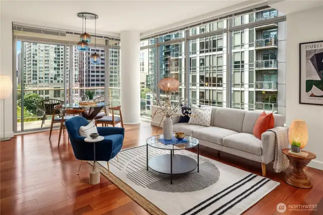 Enjoy an expansive living and dining room with hardwood floors and fresh paint.