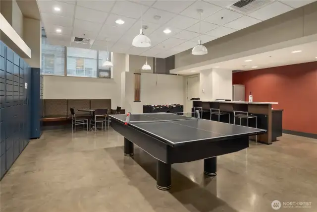 The game room is great for entertaining and also features a wall of Amazon lockers.