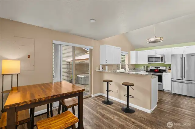 Looking into kitchen w/ SS appliances that all stay!