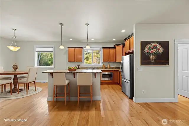 Virtually staged kitchen and dining room
