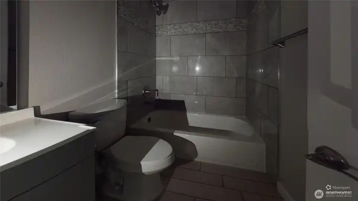 The bathrooms are great. Beautiful tile ut the power is off.  New photos soon.